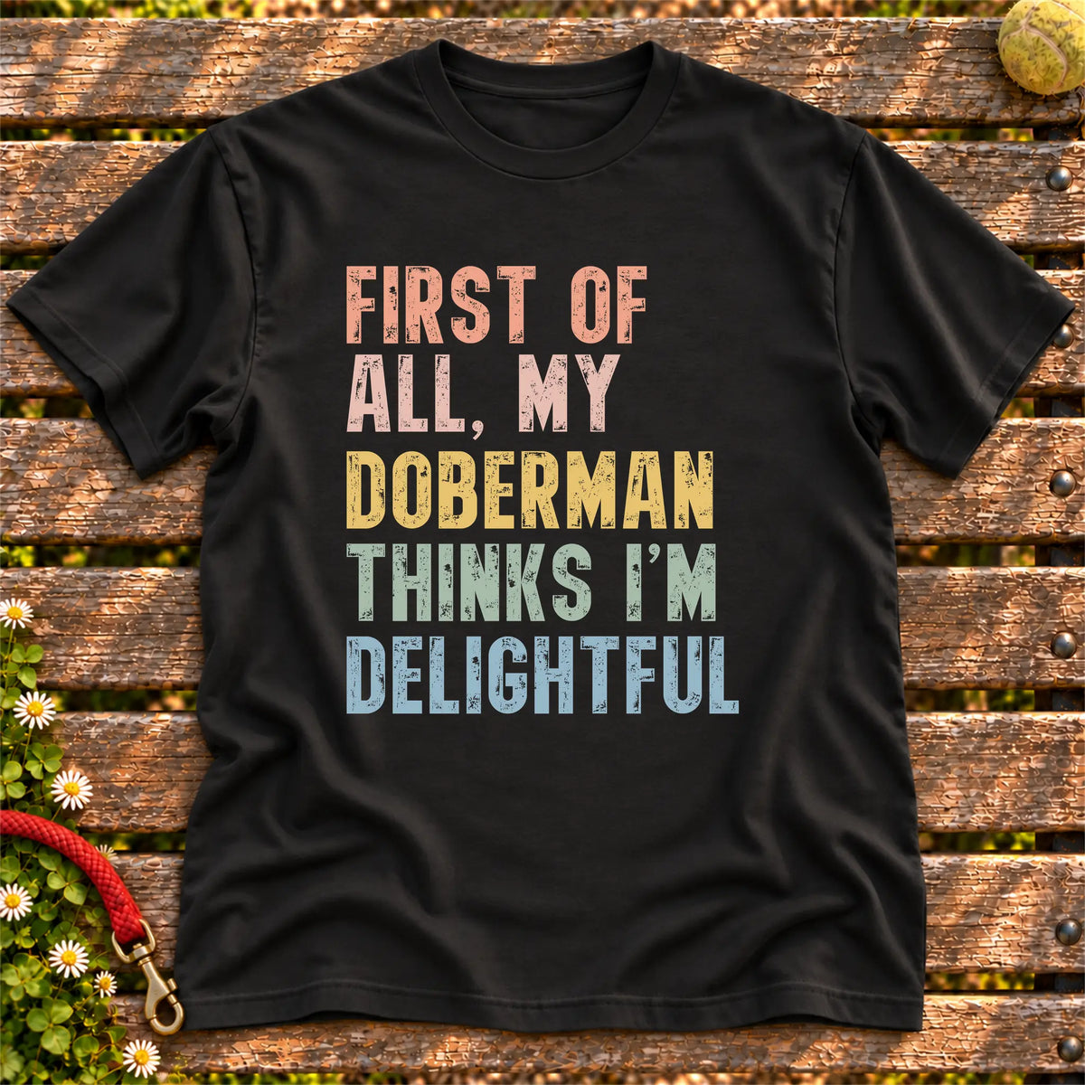 “First of all, my Doberman thinks I’m delightful” text on a Black T-shirt