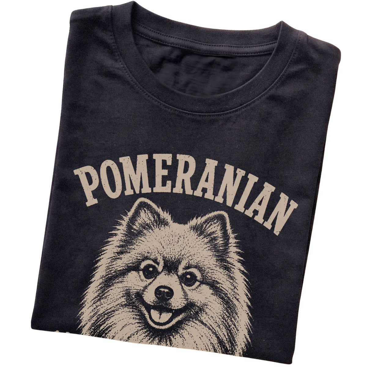 Black T-shirt featuring Fluffy, Loud & Unbothered - Pomeranian, folded presentation