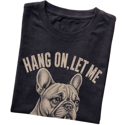 Black T-shirt featuring Overthinking French Bulldog, folded presentation