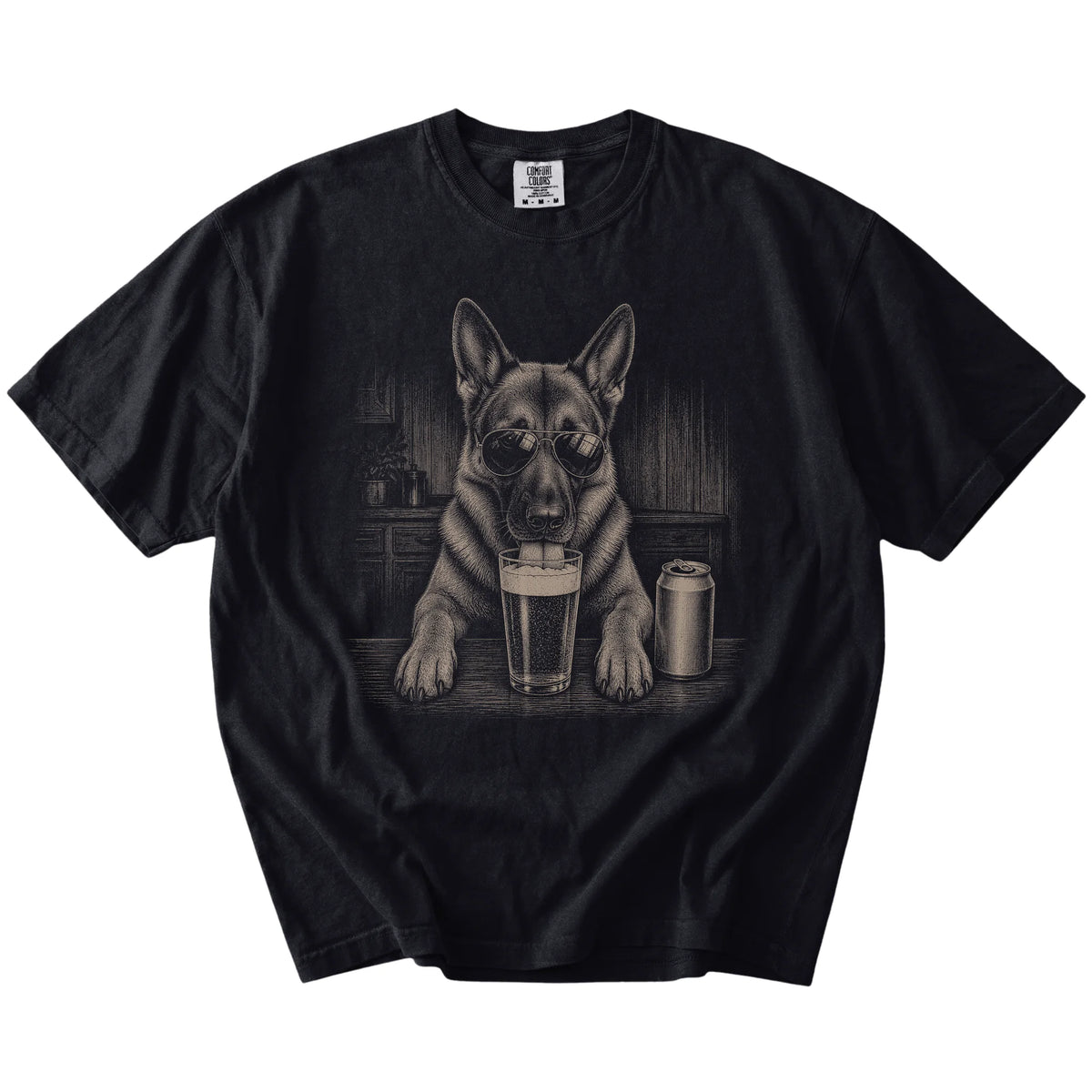 German Shepherd sneaking a drink from a foamy pint at home on a Black Comfort Colors® t-shirt
