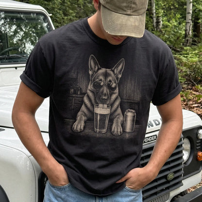 Model wearing a Black Comfort Colors® t-shirt with German Shepherd sneaking a drink from a pint