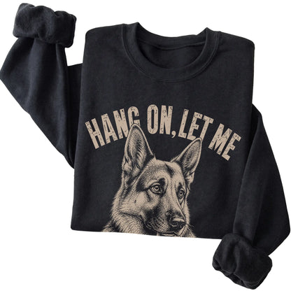 Black crewneck sweatshirt featuring Overthinking German Shepherd, folded presentation