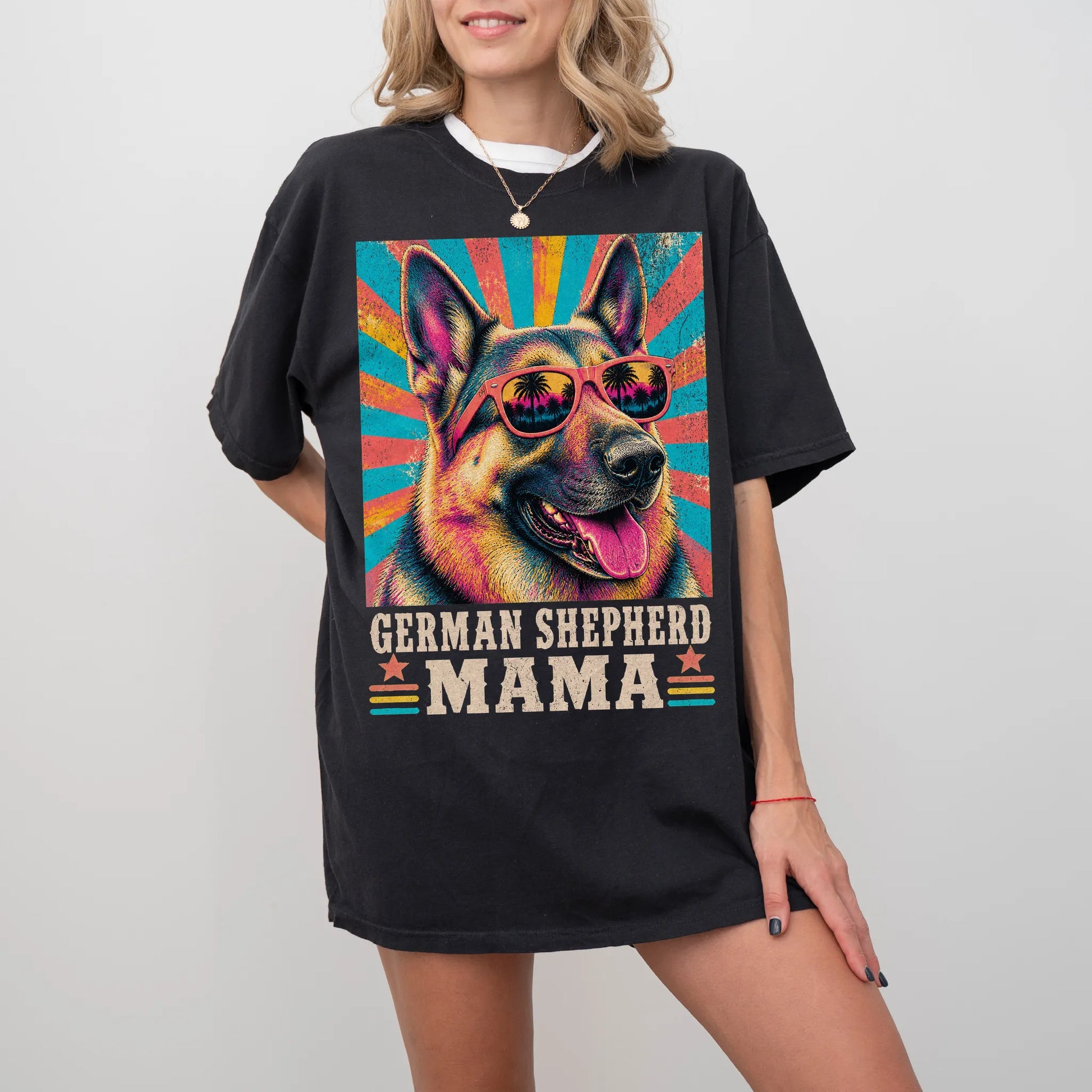 Retro German Shepherd Mama design on a Black Comfort Colors T-shirt worn by a model
