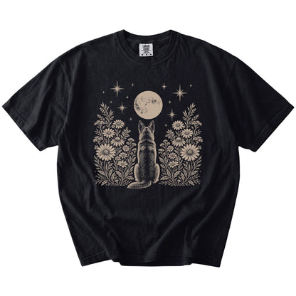 German Shepherd beneath a wildflower moon on a Black Comfort Colors® T-shirt