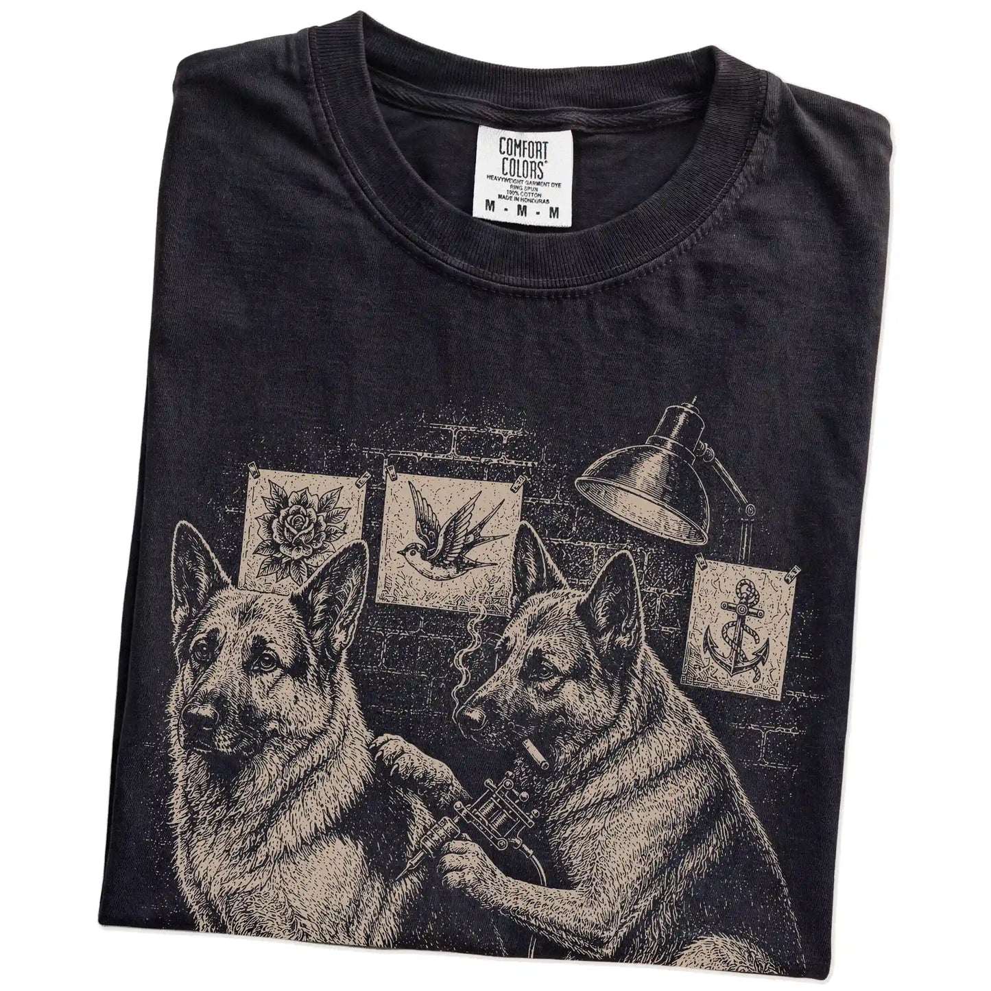 Folded Black German Shepherd Tattoo t-shirt showing the graphic