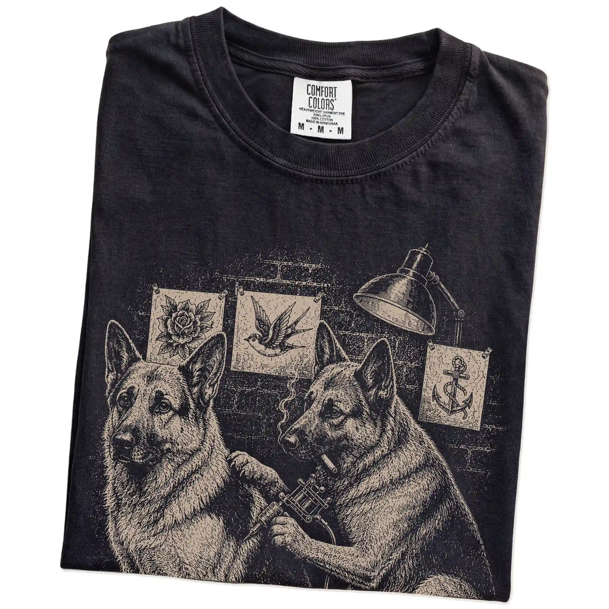 Folded Black German Shepherd Tattoo t-shirt showing the graphic