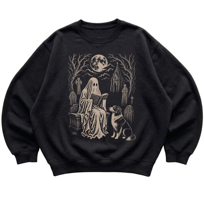 Black crewneck sweatshirt featuring Ghost Reading to Australian Shepherd, laid-flat presentation