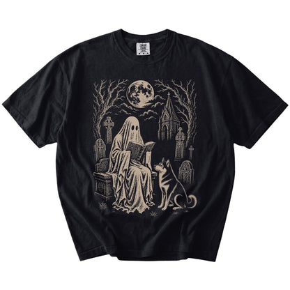 Husky beside a reading ghost in a moonlit graveyard on a Black Comfort Colors® T-shirt