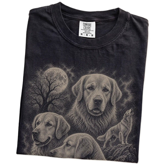 Folded Black Comfort Colors® T-shirt showing a vintage moon montage featuring Golden Retriever