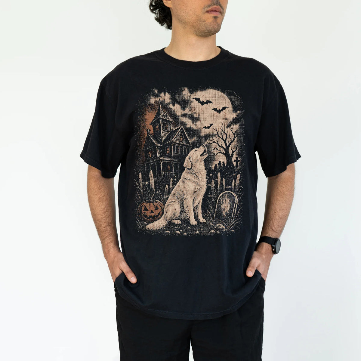 Model wearing a Black Comfort Colors® T-shirt showing Golden Retriever in a vintage haunted-house scene