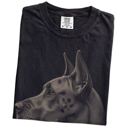 Folded Black Comfort Colors® T-shirt showing a detailed photographic portrait of a Great Dane