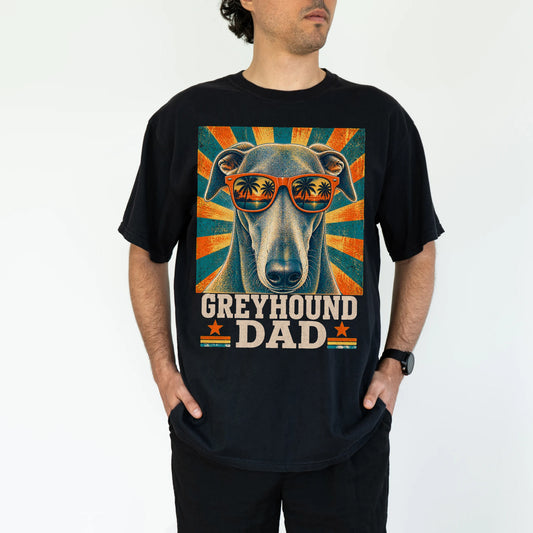 Retro Greyhound Dad design on a Black Comfort Colors T-shirt worn by a model