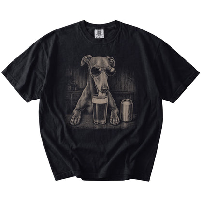 Greyhound sneaking a drink from a foamy pint at home on a Black Comfort Colors® t-shirt