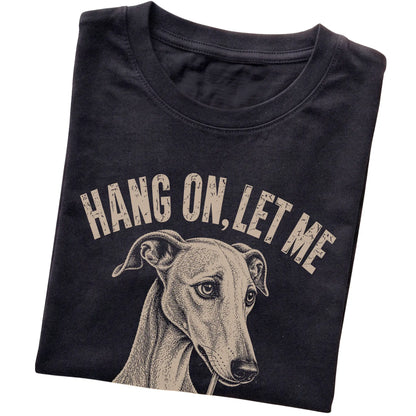 Black T-shirt featuring Overthinking Greyhound, folded presentation