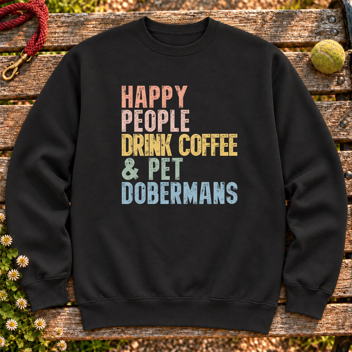 “Happy people drink coffee & pet Dobermans” text on a Black sweatshirt