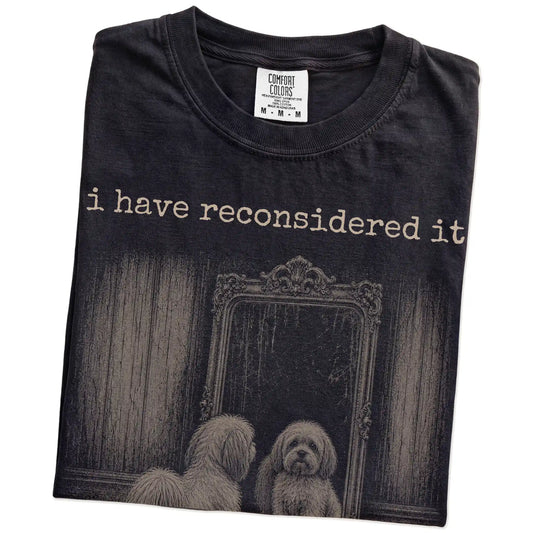 Folded Black Comfort Colors® T-shirt showing “the answer is still no” havanese design