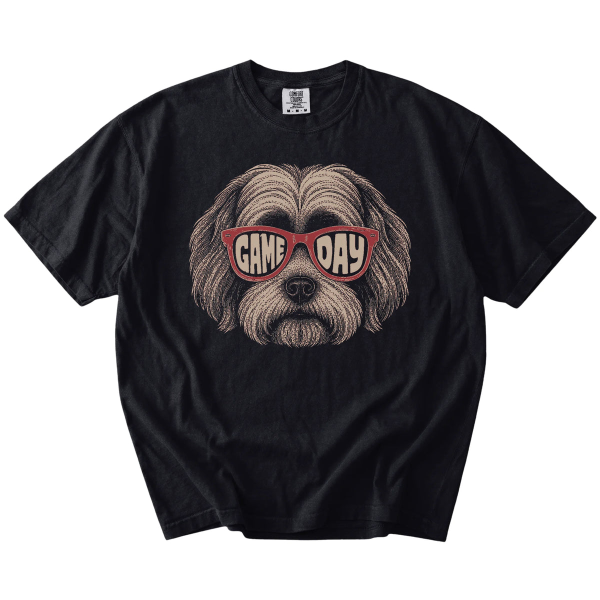 Havanese wearing red Game Day sunglasses on a Black Comfort Colors® T-shirt