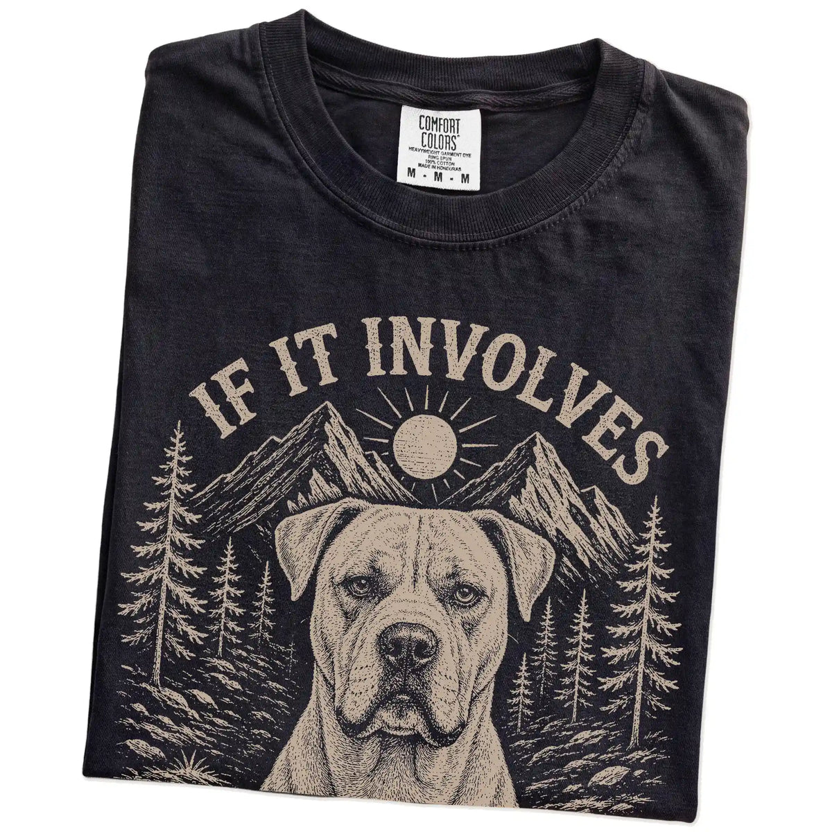 Folded Black Comfort Colors® T-shirt showing American Bulldog hiking design with mountain scenery