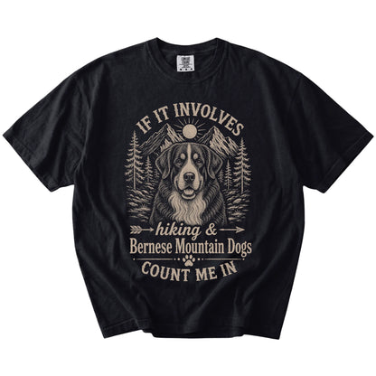 Bernese Mountain Dog hiking design with mountain scenery on a Black Comfort Colors® T-shirt