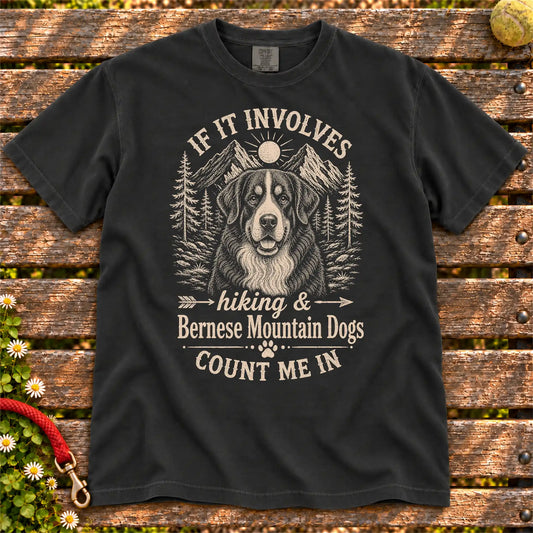 Hiking and Bernese Mountain Dogs design on a Black Comfort Colors T-shirt, shown flat