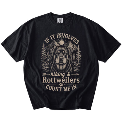 Rottweiler hiking design with mountain scenery on a Black Comfort Colors® T-shirt
