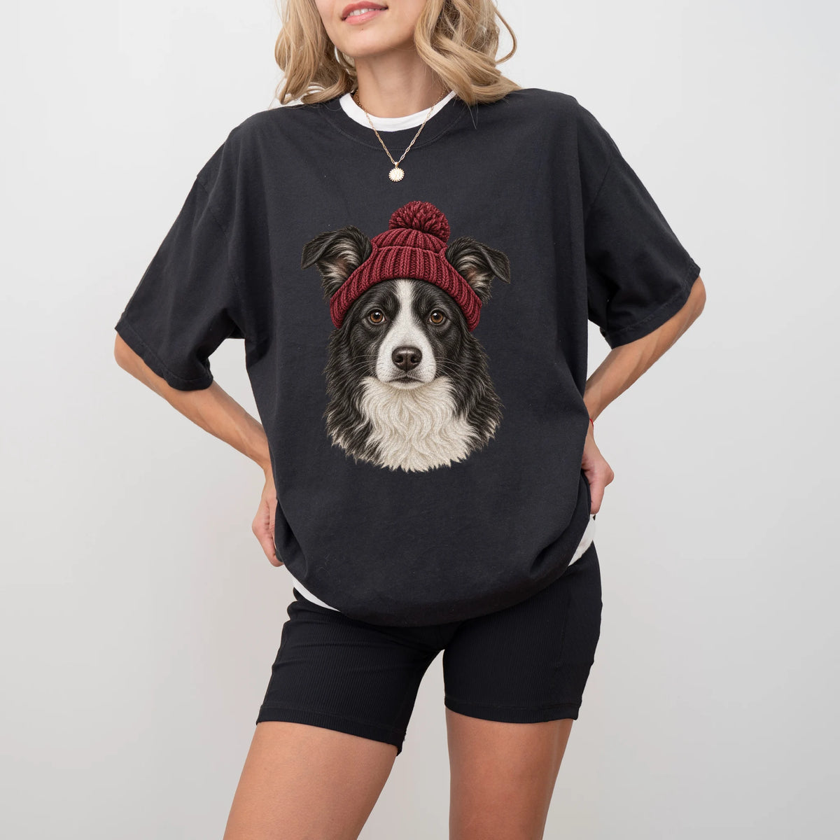 Woman wearing a Black Border Collie hipster T-shirt with a maroon-beanie dog portrait