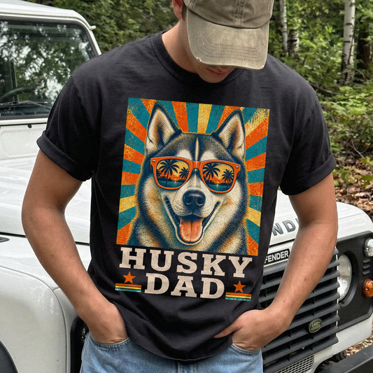 Retro Husky Dad design on a Black Comfort Colors T-shirt worn by a model