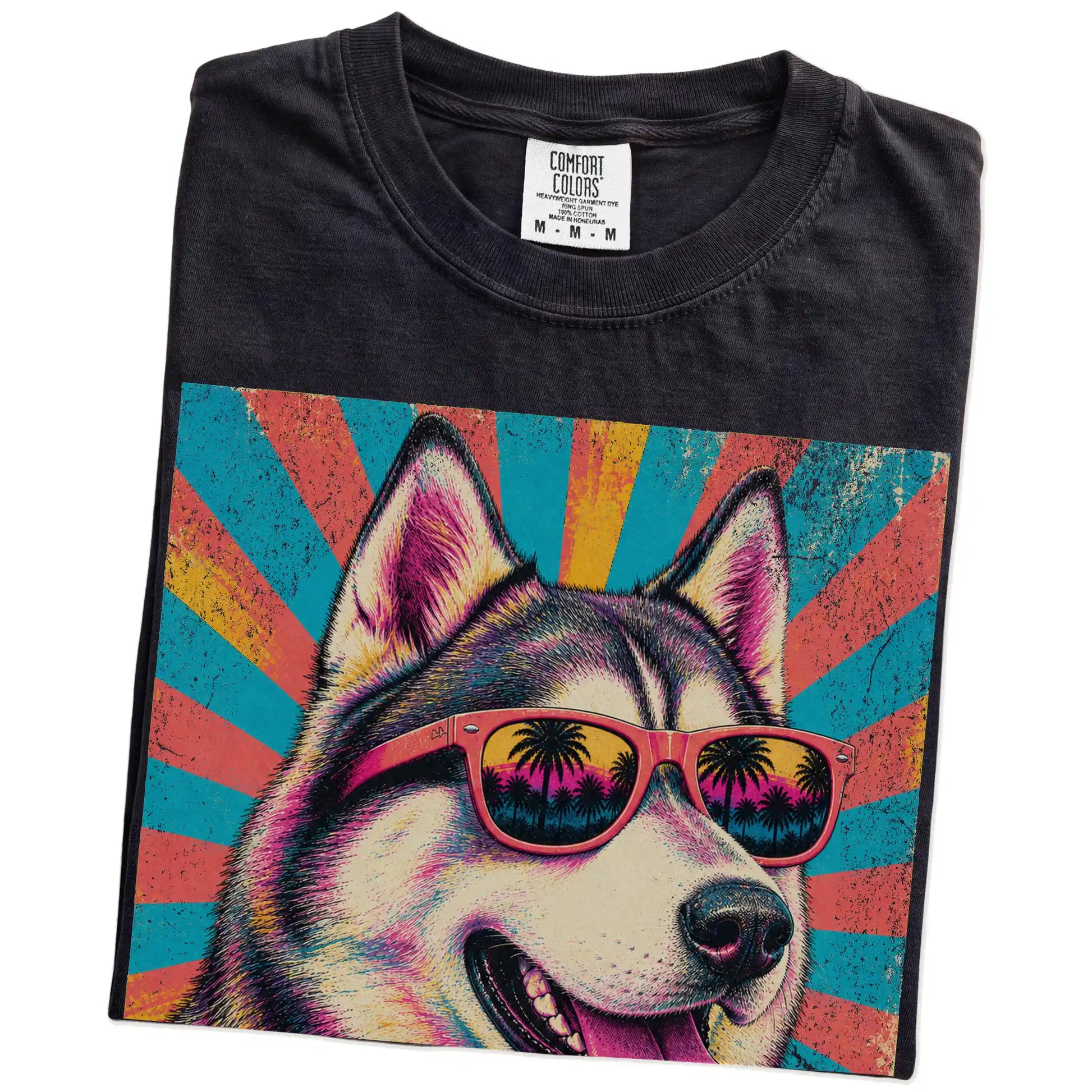 Retro Husky Mama design on a Black Comfort Colors T-shirt folded detail