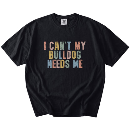 Bulldog with “I Can’t, My Dog Needs Me” lettering on a Black Comfort Colors® T-shirt