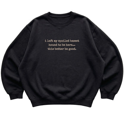 Black I Left My Spoiled Basset Hound sweatshirt laid flat