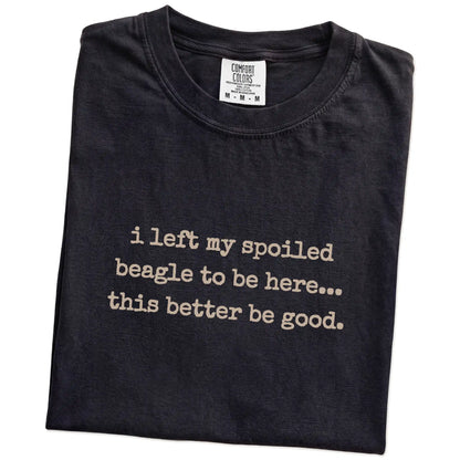 Folded Black Comfort Colors® T-shirt showing the “I Left My Spoiled Beagle Home” saying