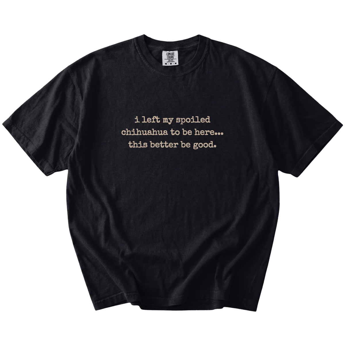“I Left My Spoiled Chihuahua Home” saying on a Black Comfort Colors® T-shirt