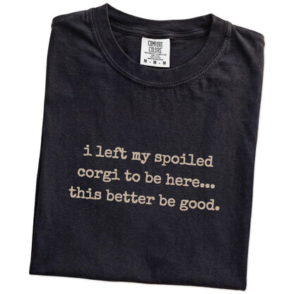 Folded Black Comfort Colors® T-shirt showing the “I Left My Spoiled Corgi Home” saying