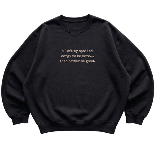 Black I Left My Spoiled Corgi sweatshirt laid flat
