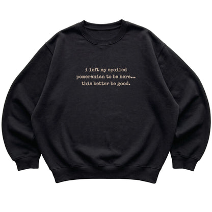Black I Left My Spoiled Pomeranian sweatshirt laid flat