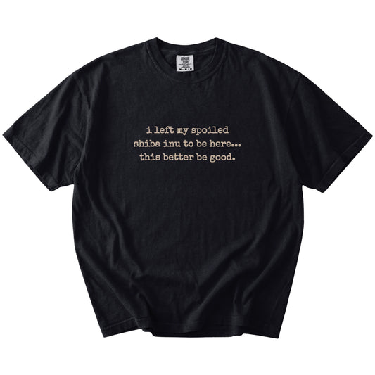 “I Left My Spoiled Shiba Inu Home” saying on a Black Comfort Colors® T-shirt