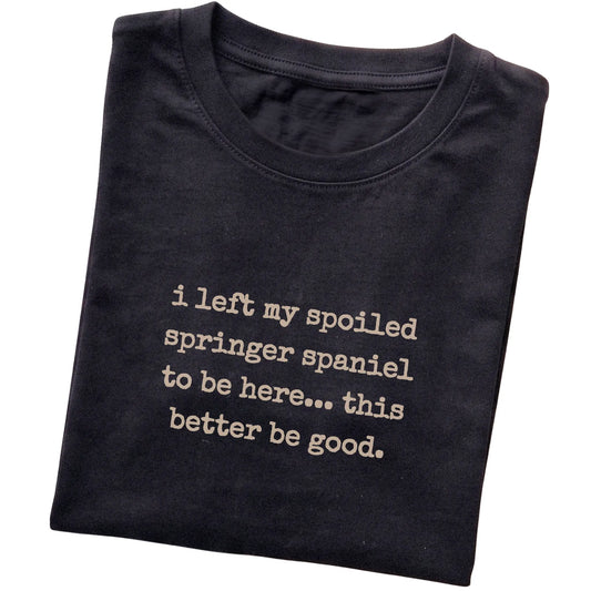 Black I Left My Spoiled Springer Spaniel T-shirt folded to show the printed design
