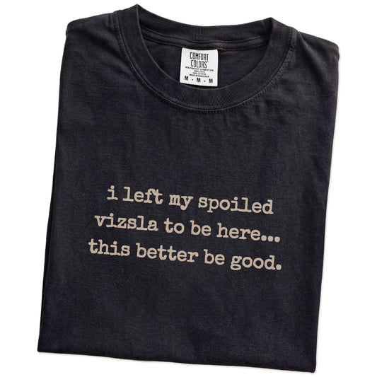 Folded Black Comfort Colors® T-shirt showing the “I Left My Spoiled Vizsla Home” saying