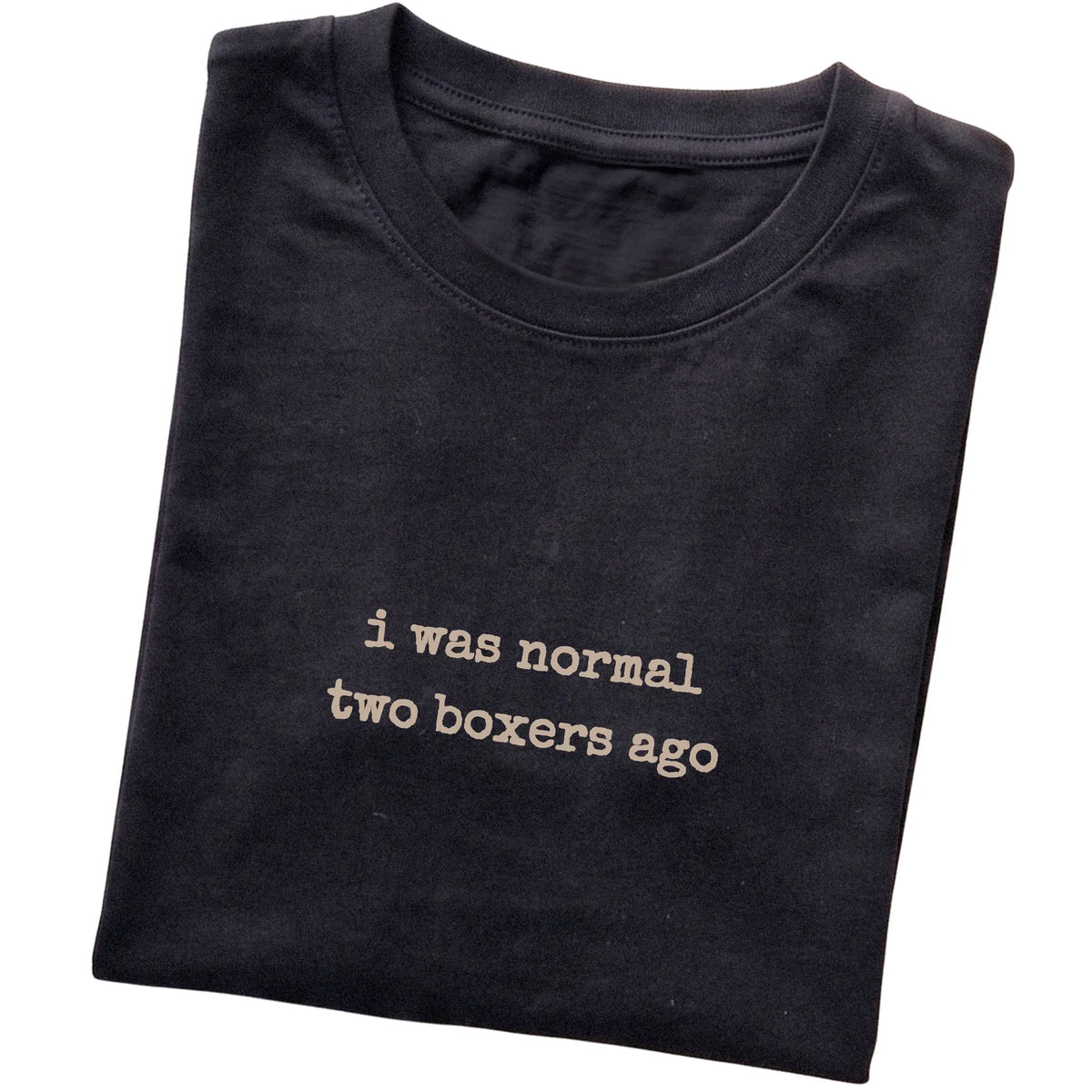 Black I Was Normal Two Boxers Ago T-shirt folded to show the printed design