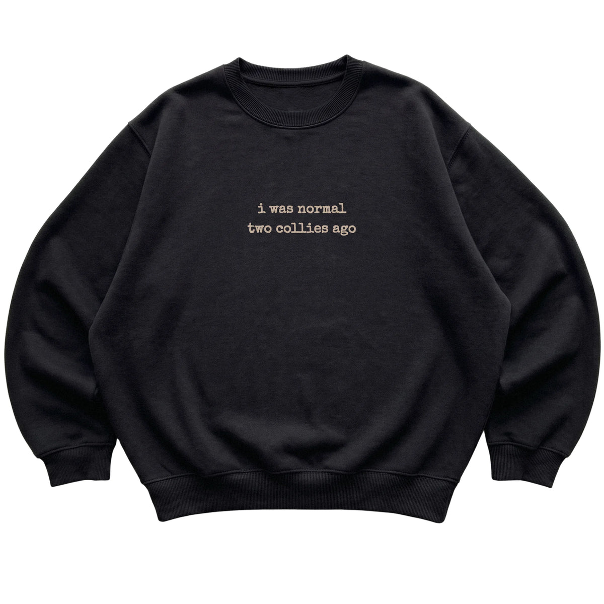 Black I Was Normal Two Collies Ago sweatshirt laid flat