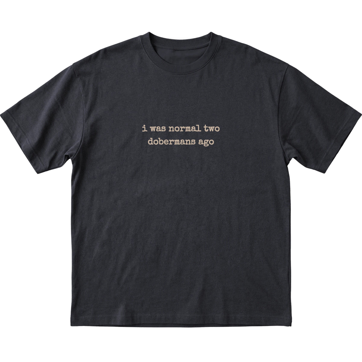 Black I Was Normal Two Dobermans Ago T-shirt laid flat