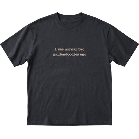Black I Was Normal Two Goldendoodles Ago T-shirt laid flat