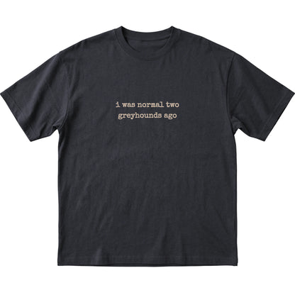 Black I Was Normal Two Greyhounds Ago T-shirt laid flat