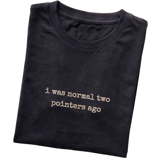 Black I Was Normal Two Pointers Ago T-shirt folded to show the printed design