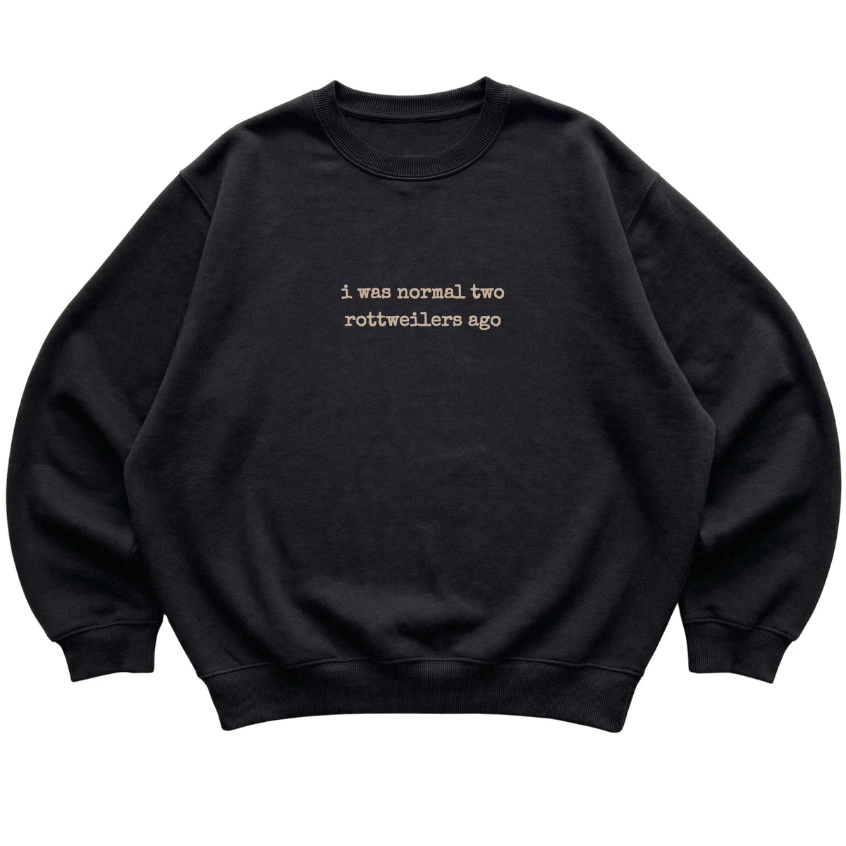 Black I Was Normal Two Rottweilers Ago sweatshirt laid flat