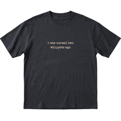 Black I Was Normal Two Whippets Ago T-shirt laid flat