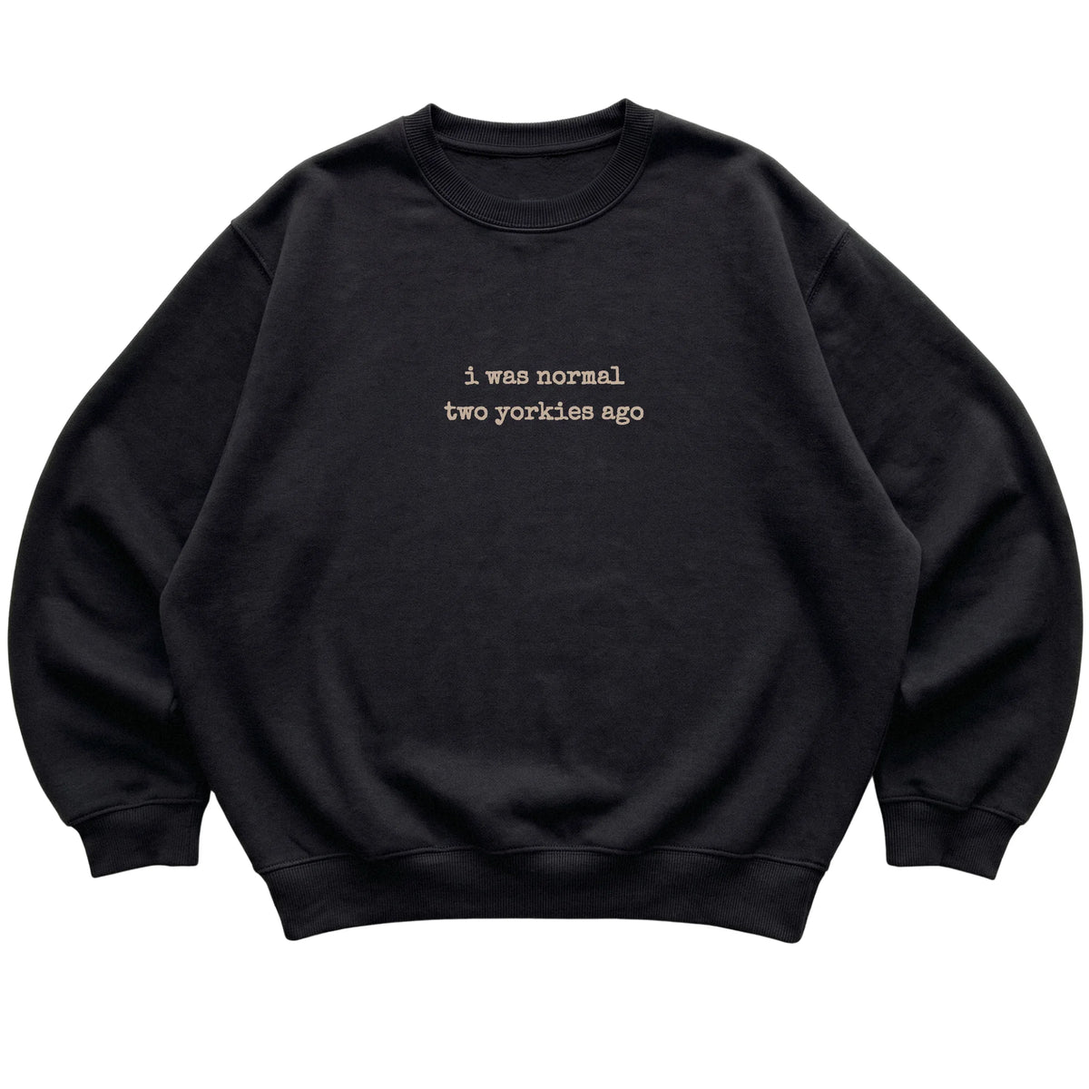 Black I Was Normal Two Yorkies Ago sweatshirt laid flat