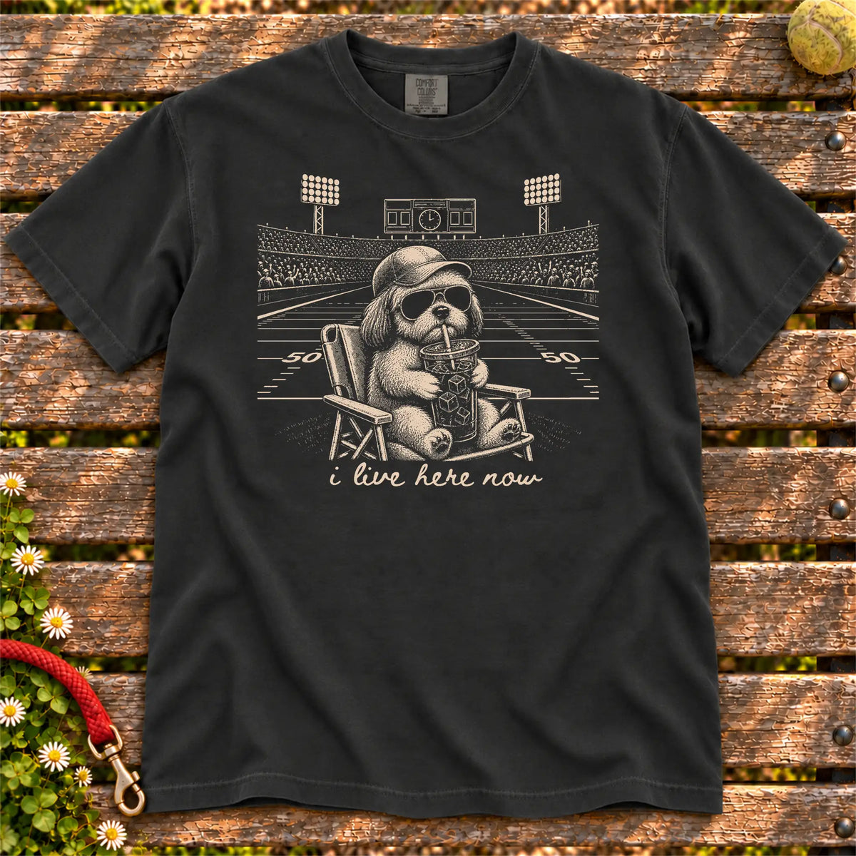 Shih Tzu Iced Coffee Football design on a Black Comfort Colors T-shirt, shown flat