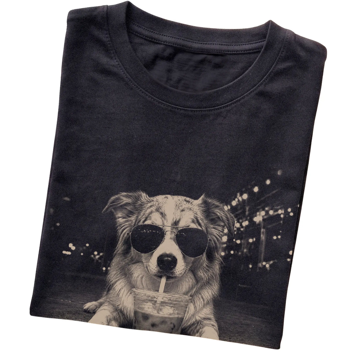 Australian Shepherd wearing aviator sunglasses and drinking iced coffee on a Black Gildan Softstyle T-Shirt, folded view