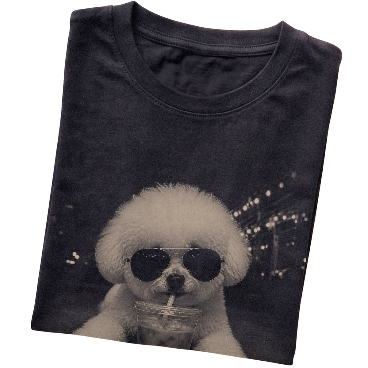 Bichon Frise wearing aviator sunglasses and drinking iced coffee on a Black Gildan Softstyle T-Shirt, folded view